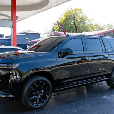 Cadillac Escalade Tint: 3M Crystalline applied to all four windows, front & rear windshields plus side indicators Cadillac Escalade Tint: 3M Crystalline applied to all four windows, front & rear windshields plus side indicators