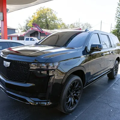 Cadillac Escalade Tint: 3M Crystalline applied to all four windows, front & rear windshields plus side indicators Cadillac Escalade Tint: 3M Crystalline applied to all four windows, front & rear windshields plus side indicators
